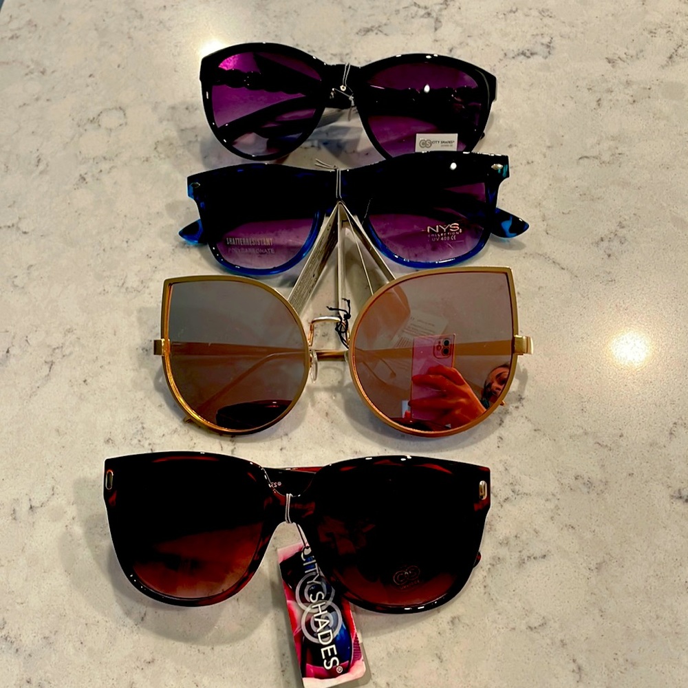 Fun four pack of sunglasses never used before brand new with tags